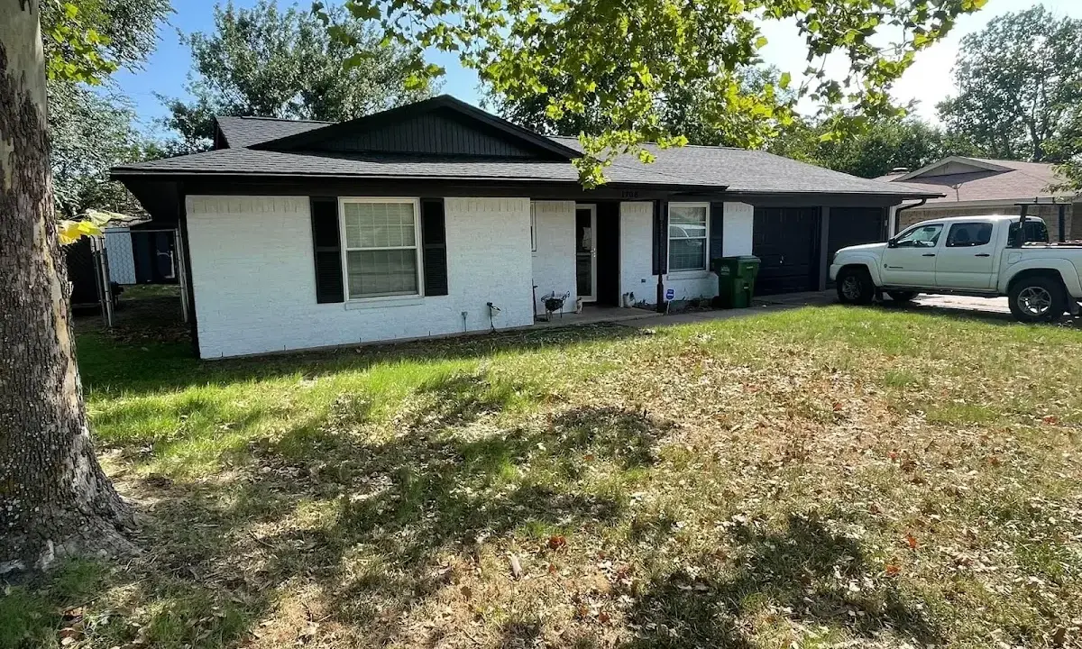 Professional roofing crew working on a residential roof in Medway